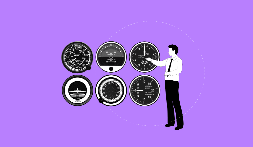 A teacher pointing to a series of instrument clusters, used by pilots to fly safely.